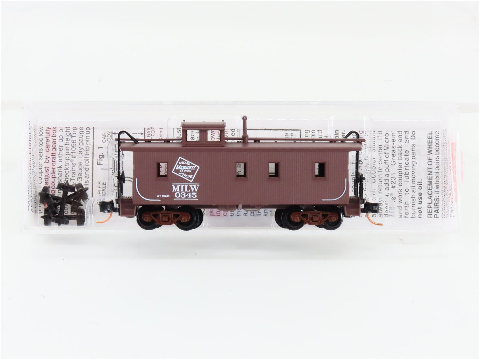 N Micro-Trains MTL 51230 MILW Milwaukee Road 34' Wood Sheathed Caboose #0345