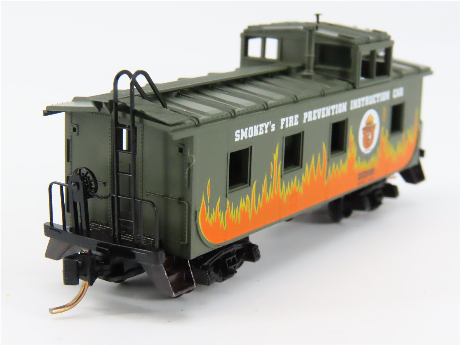 N Scale Micro-Trains 100100 Smokey Bear 36' Offset Cupola Caboose X62000 RTR