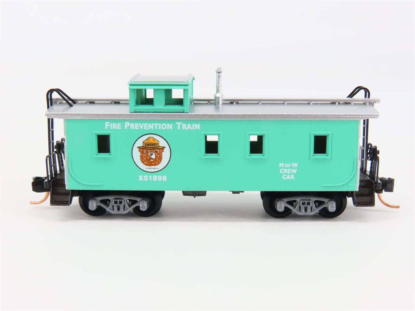 N Scale Micro-Trains 51210 Smokey Bear 34' Wood Sheathed Caboose X51898 RTR