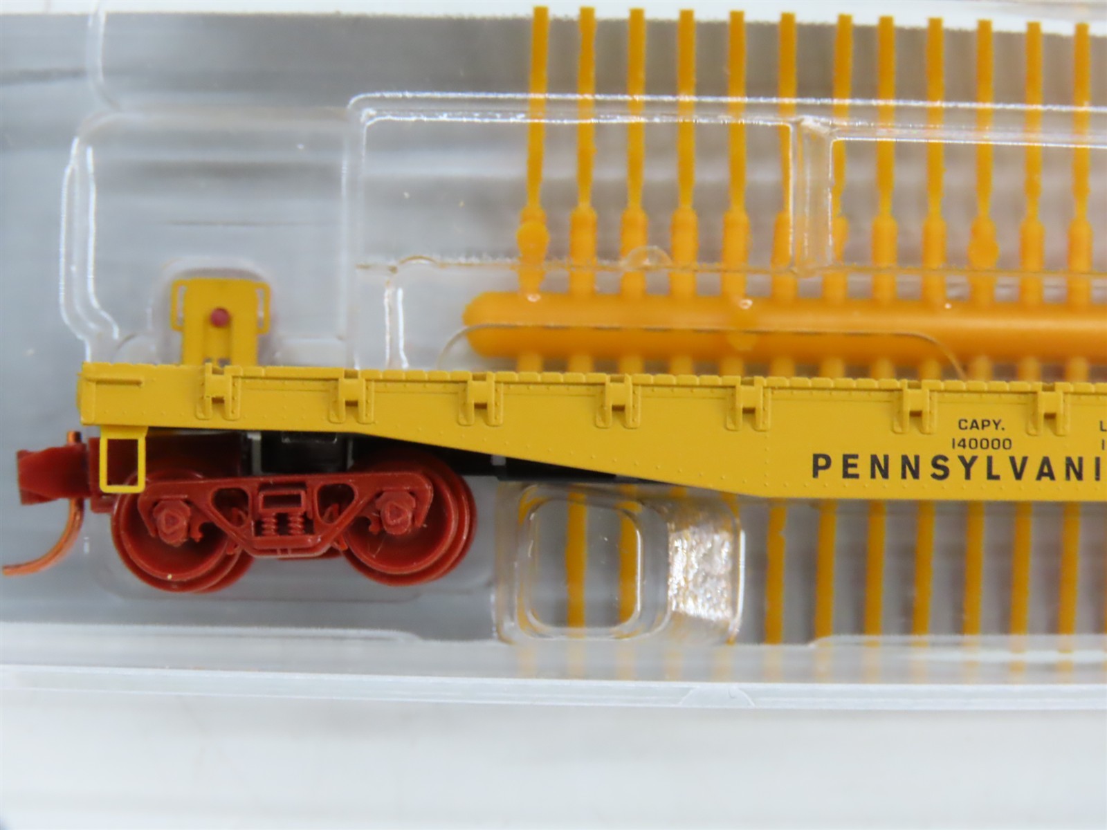 N Scale Micro-Trains NSEMTL11-79 Pennsylvania 50' Flat Car with Load of Rail RTR
