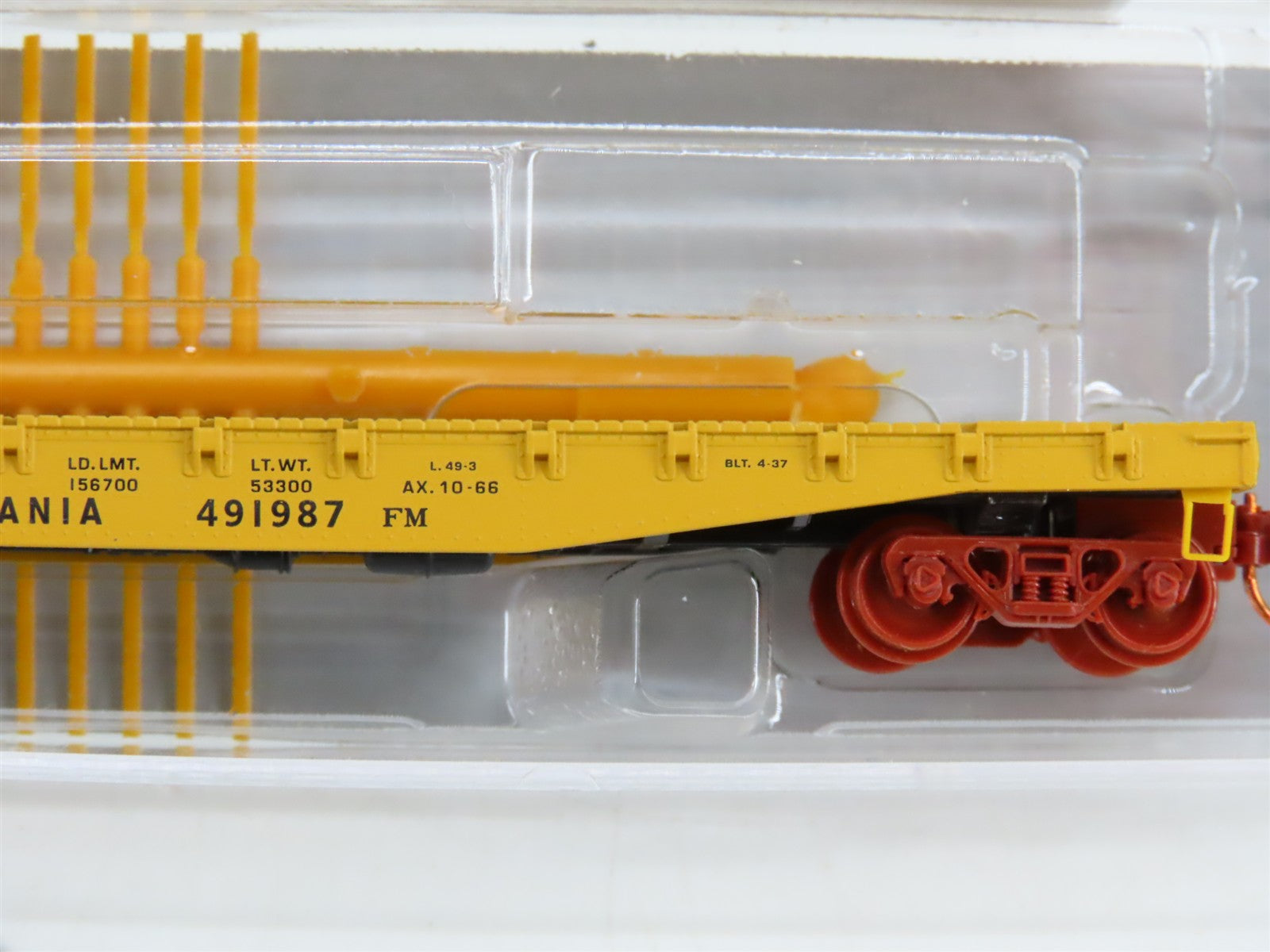 N Scale Micro-Trains NSEMTL11-79 Pennsylvania 50' Flat Car with Load of Rail RTR