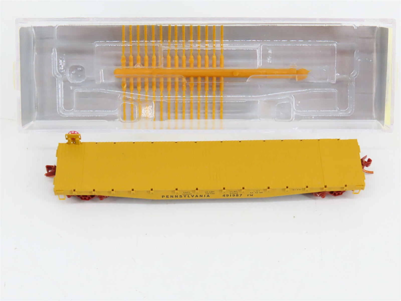 N Scale Micro-Trains NSEMTL11-79 Pennsylvania 50' Flat Car with Load of Rail RTR