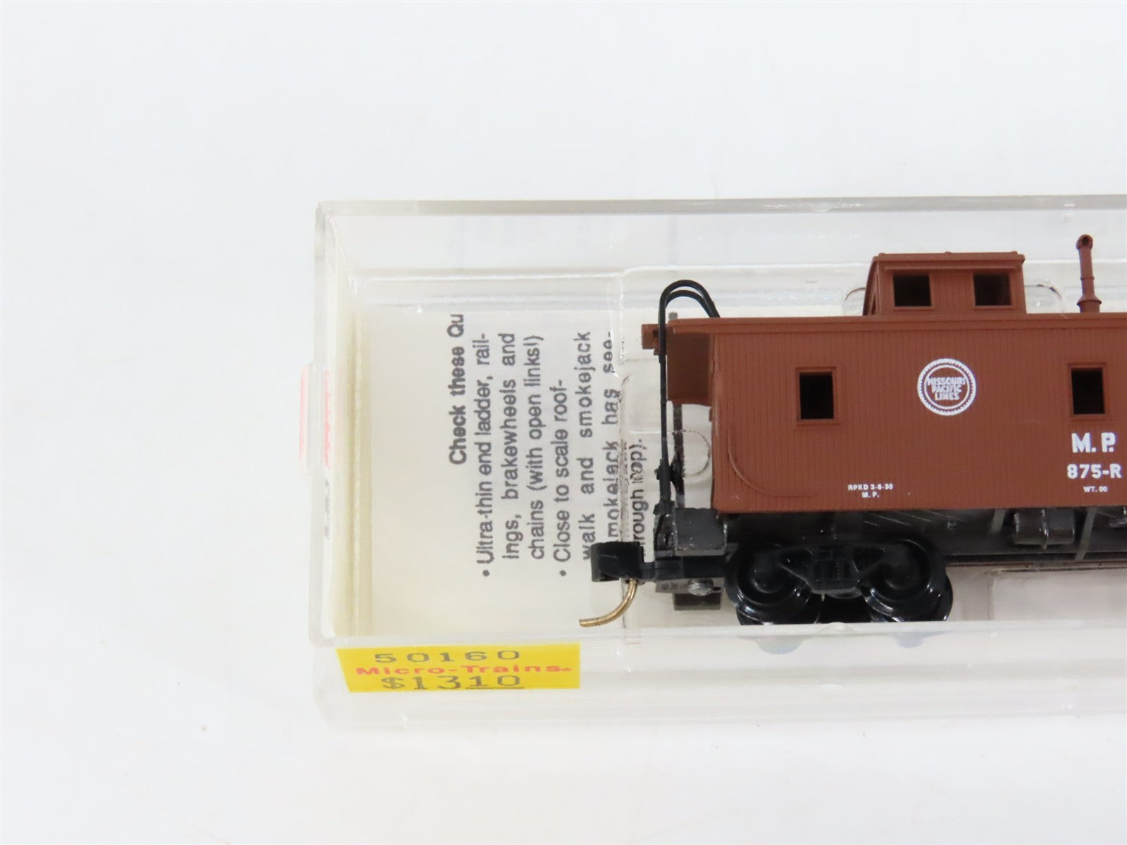 N Scale Micro-Trains MTL 50160 MP Missouri Pacific 34' Caboose 875-R