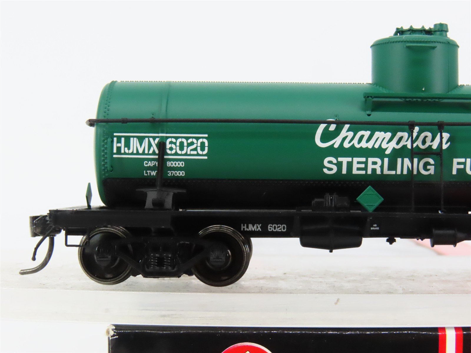 HO Scale InterMountain 46329-02 HJMX Champion Oils / Sterling Fuels Tank Car RTR