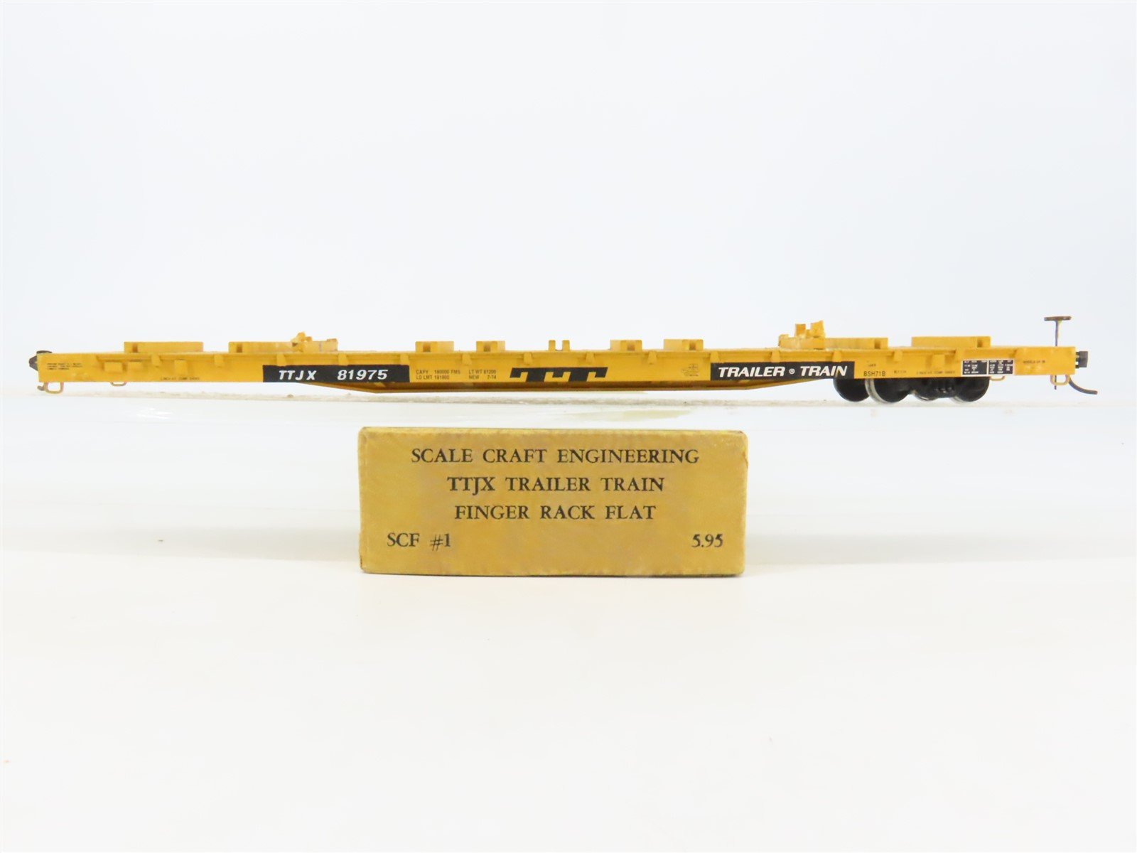 HO Scale-Craft SCF-1 TTJX Finger Rack Flat Car #81975 w/ Load - Custom