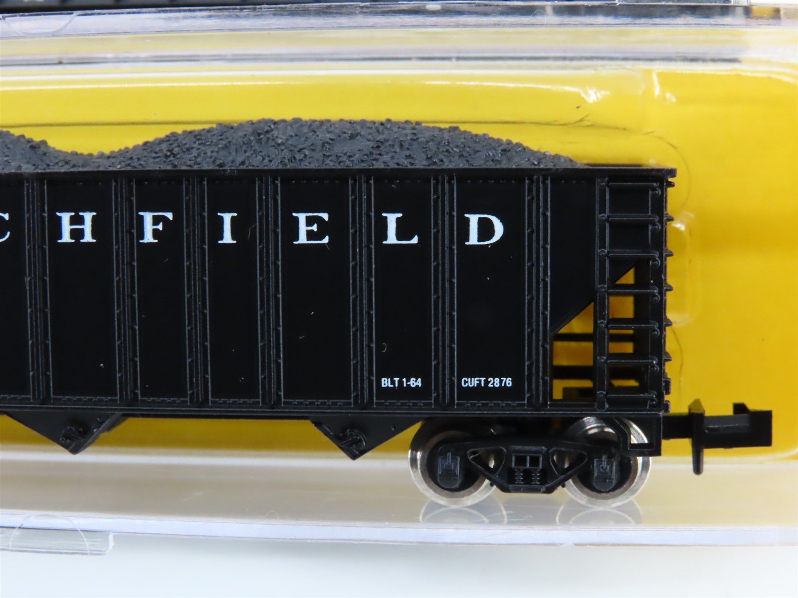 LOT of 4 N Scale Atlas PRR/CRR/RDG 3-Bay Open Hopper Cars w/Coal Load