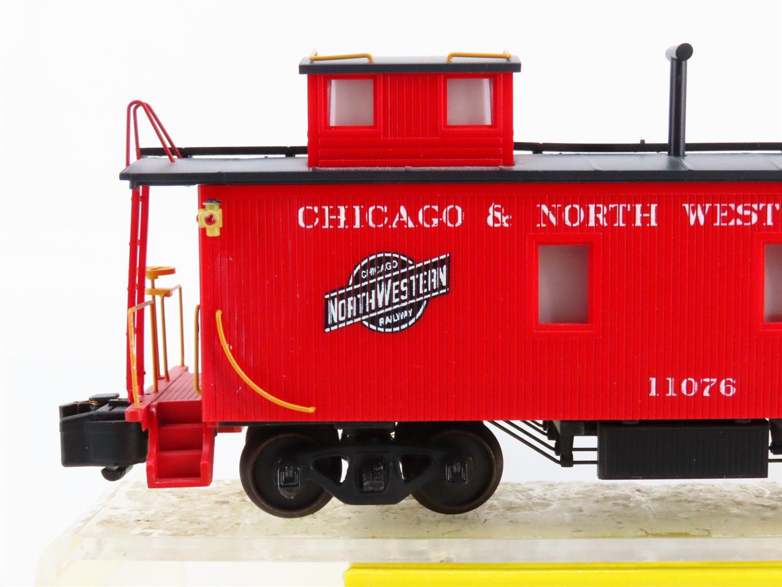 S Scale American Models 7507 Chicago & North Western Wood Caboose Lighted RTR