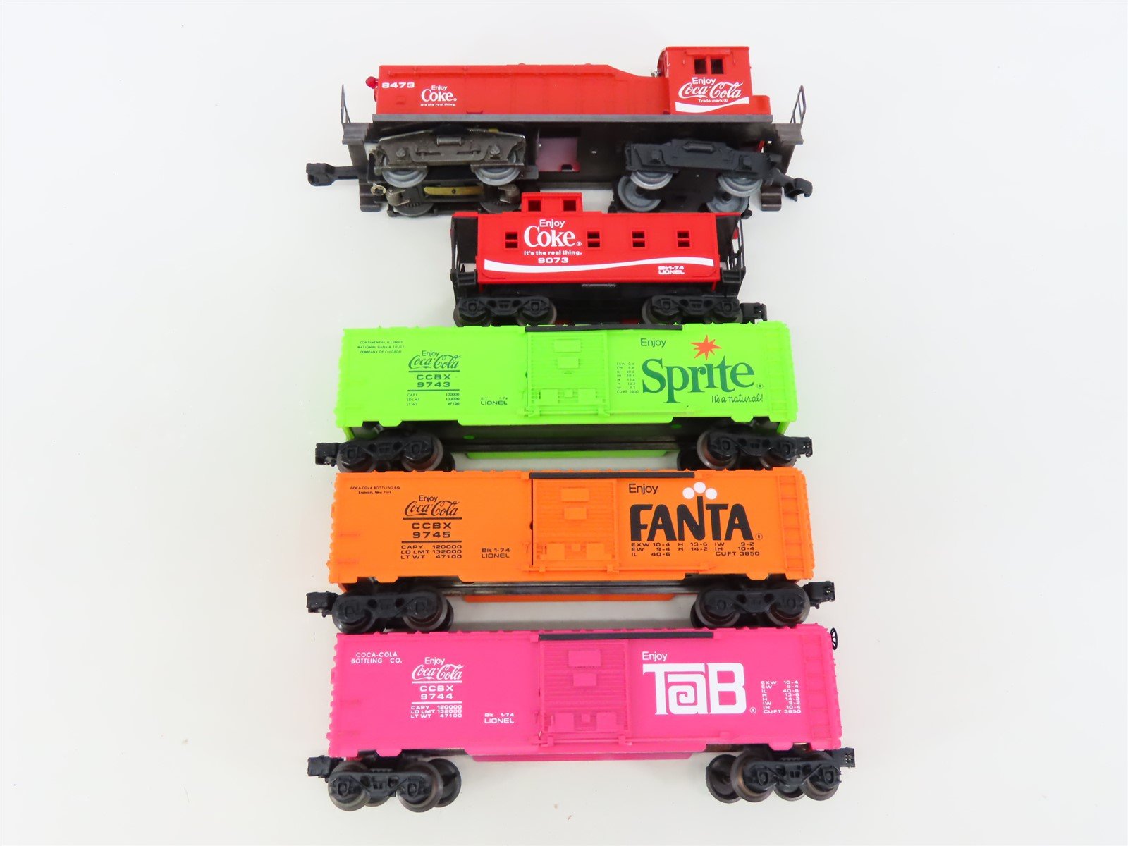 O Gauge 3-Rail Lionel 8473 Coca-Cola, Sprite, Tab & Fanta NW2 Diesel Freight Set