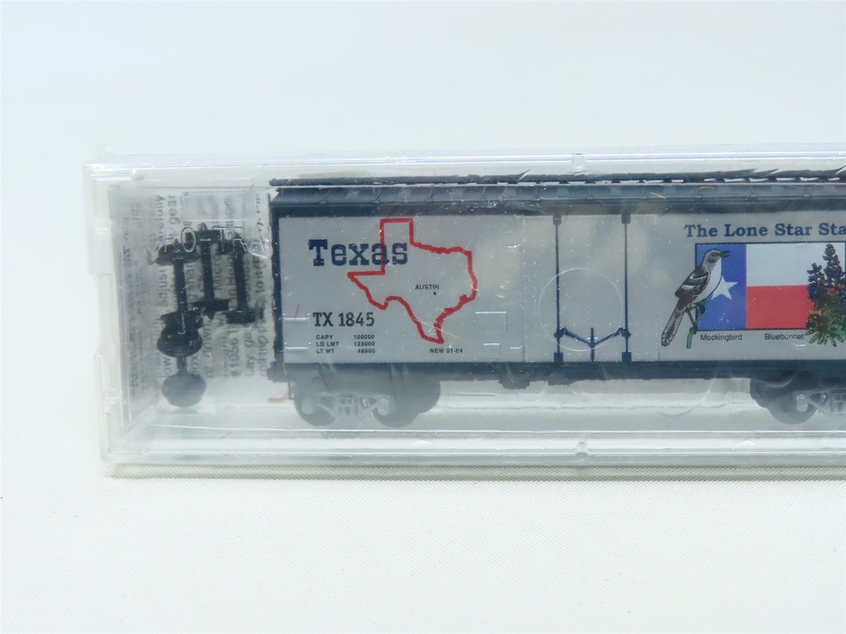 N Scale Micro-Trains MTL 21374 TX Texas State 40&#39; Plug Door Box Car #1845 Sealed