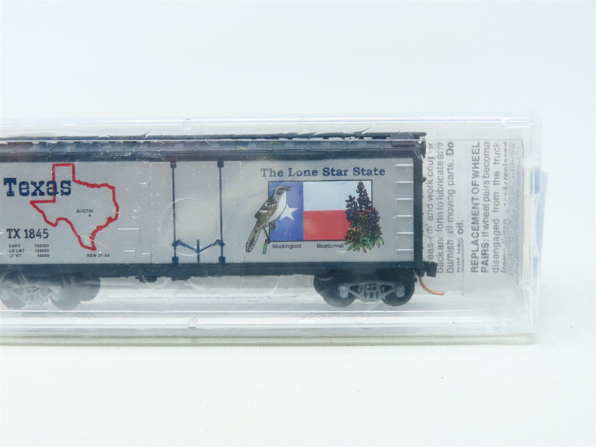 N Scale Micro-Trains MTL 21374 TX Texas State 40&#39; Plug Door Box Car #1845 Sealed