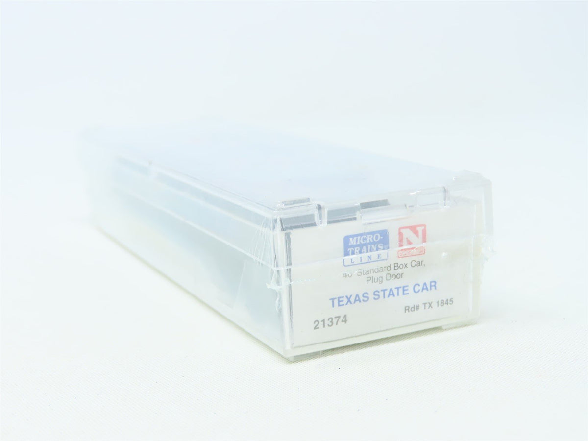 N Scale Micro-Trains MTL 21374 TX Texas State 40&#39; Plug Door Box Car #1845 Sealed