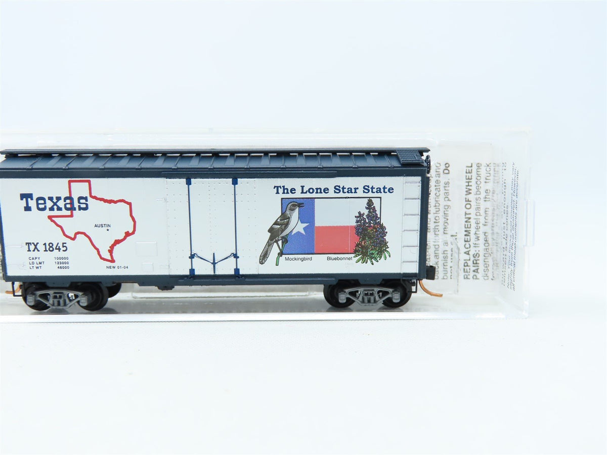 N Scale Micro-Trains MTL #21374 TX Texas State Car 40&#39; Plug Door Box Car #1845